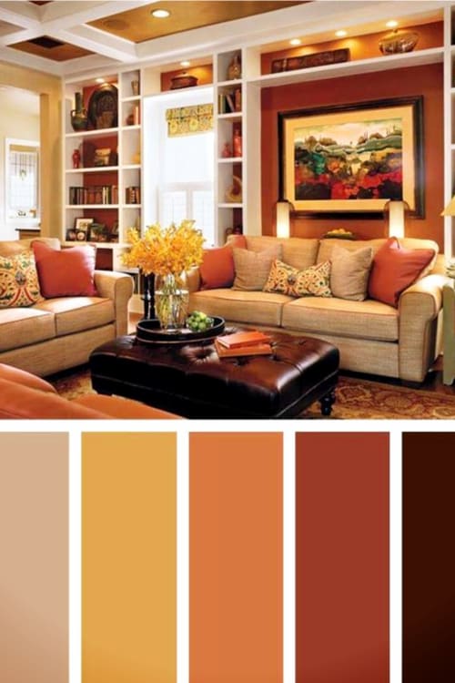 Beautiful warm paint colors for living rooms - both big family rooms and small lving rooms.  Autumn toned colors and earth tone paint colors for your living room with a pop of bold color for accent.  So comfy and cozy!