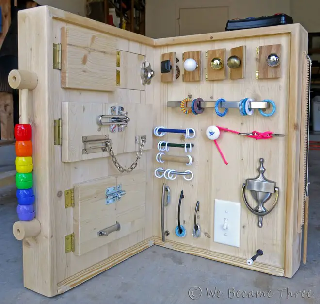 This is a great busy board idea but not sure I could make it.  The wood working looks a little advanced.