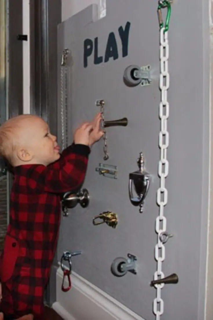 Wall activity busy board for toddlers.  Love this idea but I think the sensory boards needs more stuff on it to lay with.