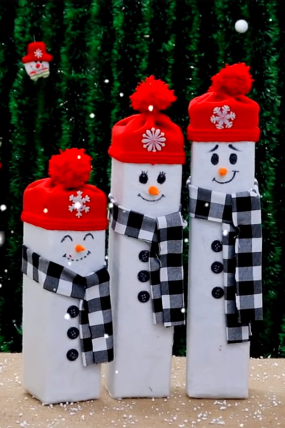 Christmas crafts for adults-simple Christmas craft ideas for adults to make - like these DIY snowmen with cute buffalo plaid scarves and red hats - so cute!