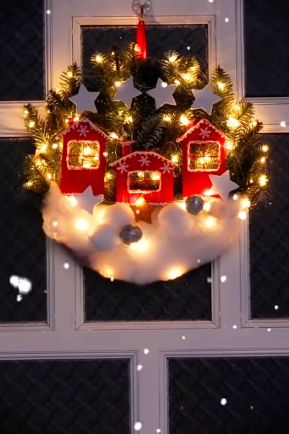 Christmas crafts for adults-simple Christmas craft ideas for adults to make - like this DIY Christmas wreath with fake snow, little houses and twinkle lights