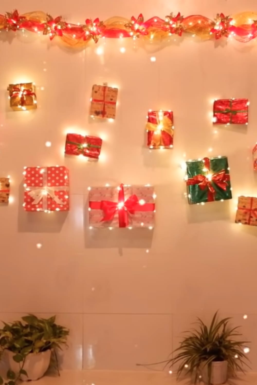 Christmas crafts for adults-simple Christmas craft ideas for adults to make - like this DIY wall decoration with twinkle lights and wrapped gifts - so cute!