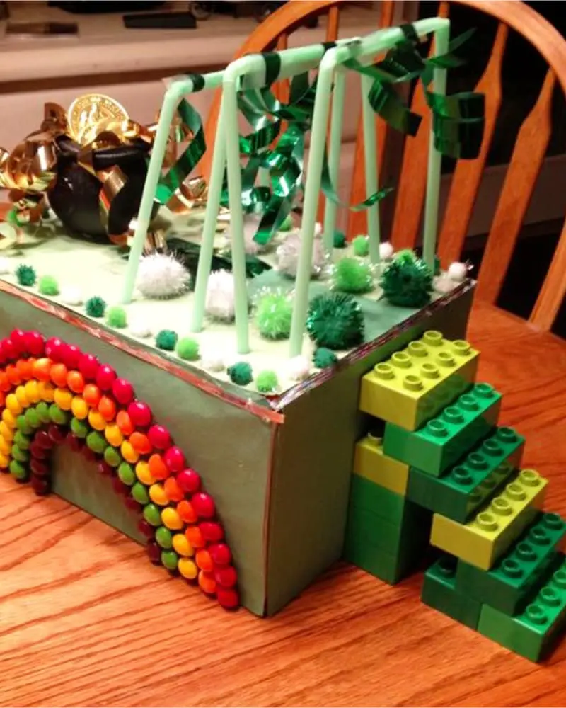 leprechaun trap ideas - shoebox leprechaun trap box with LEGO stairs, Skittles rainbow and pot of gold trap door kindergarten class project for St Patricks Day