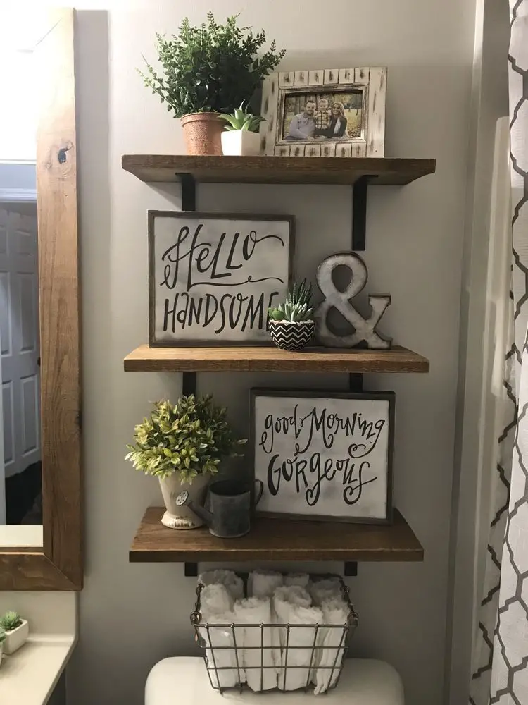Picture and Shelf Arrangements on Walls in Small Bathroom