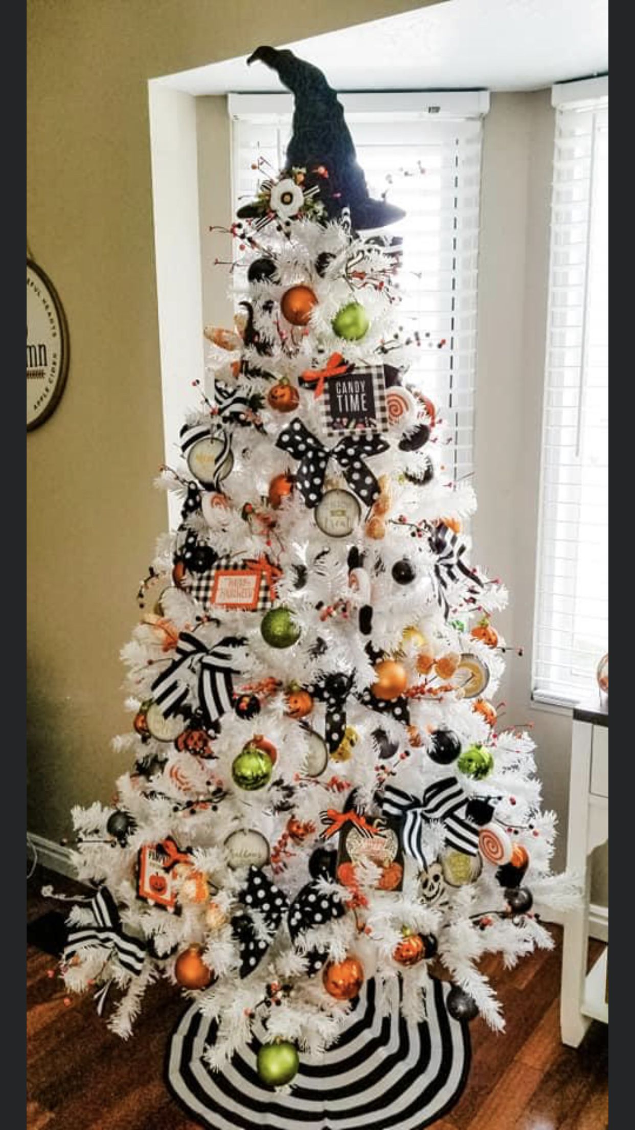 white artificial christmas tree decorated for Halloween - my year round Holiday tree ideas