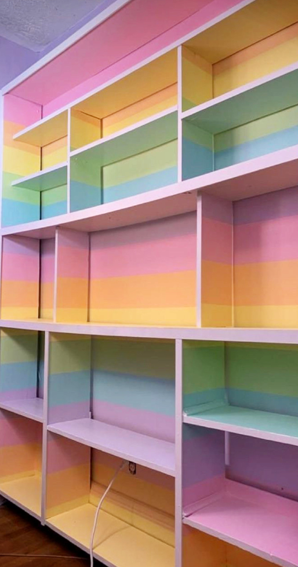 rainbow painted shelves for craft organization