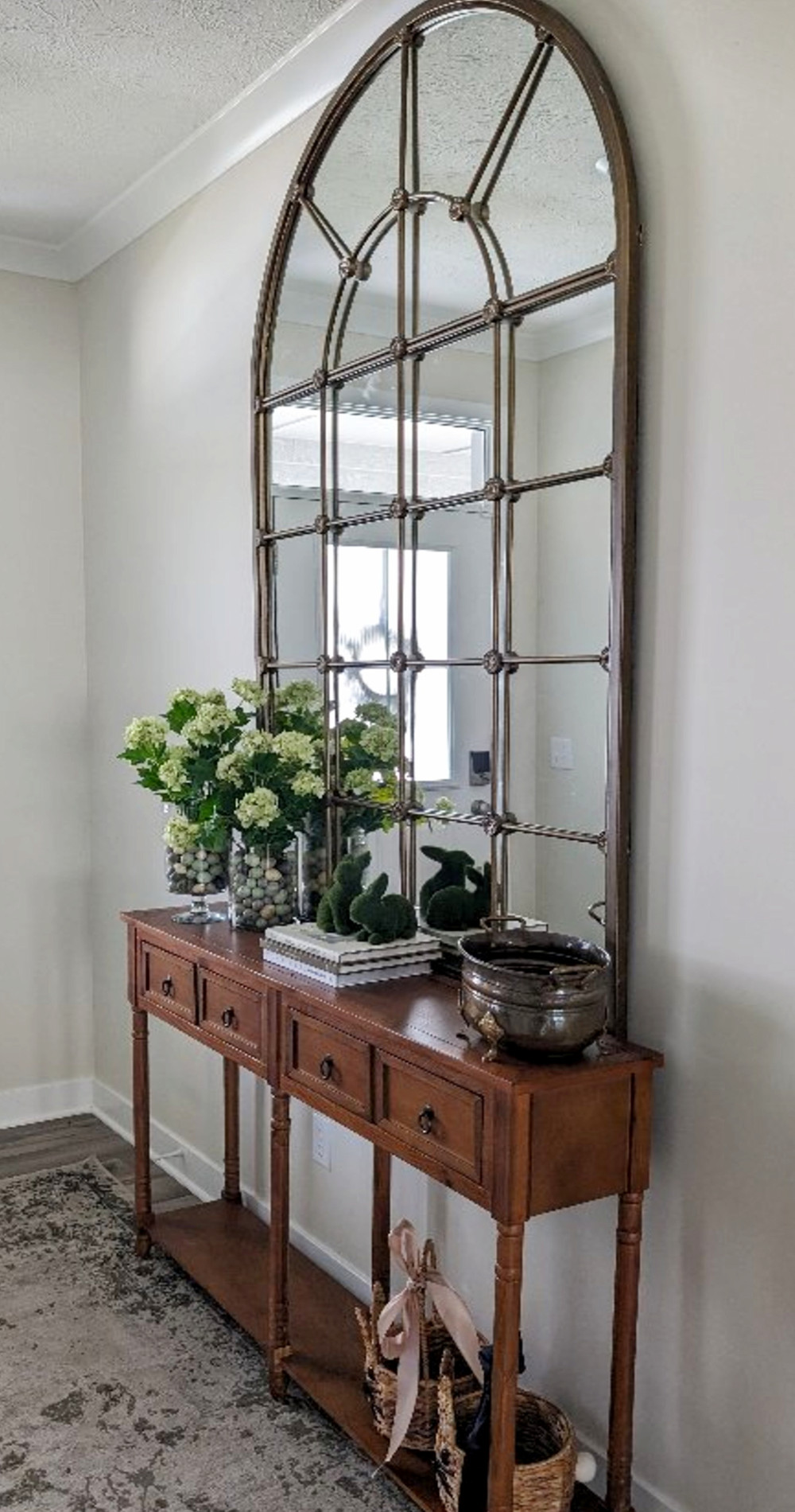 narrow foyer decor arched mirror wall decor over narrow console table