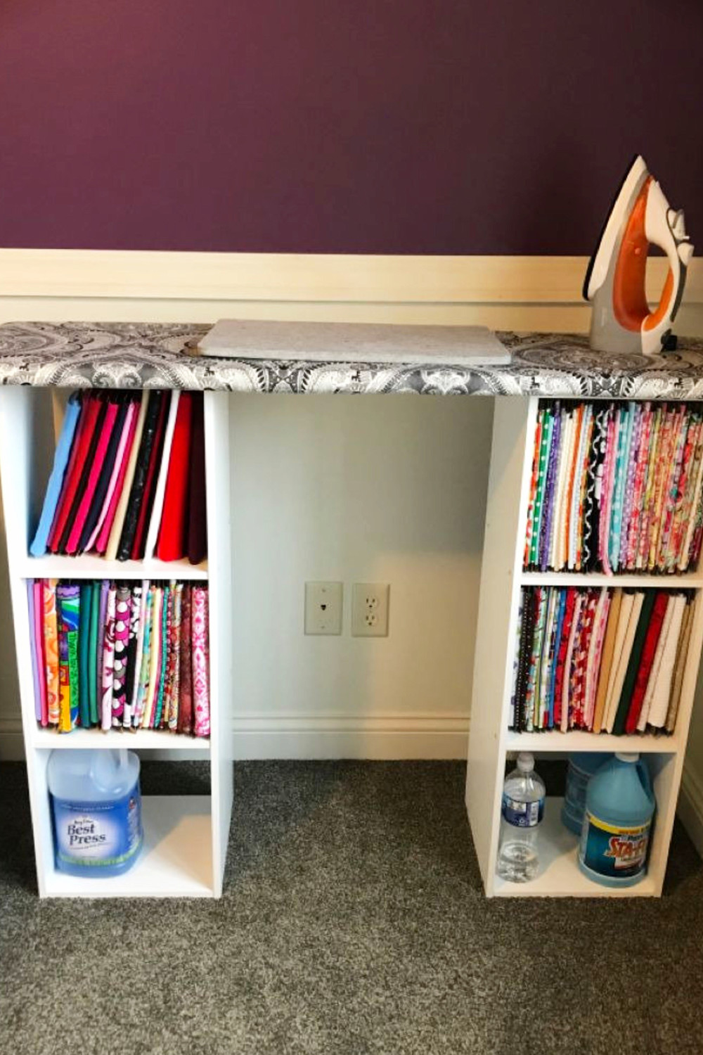 sewing room organization system for organizing fabric and a space to iron material