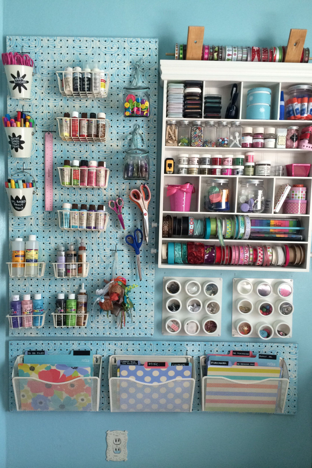 peg board wall for craft organization